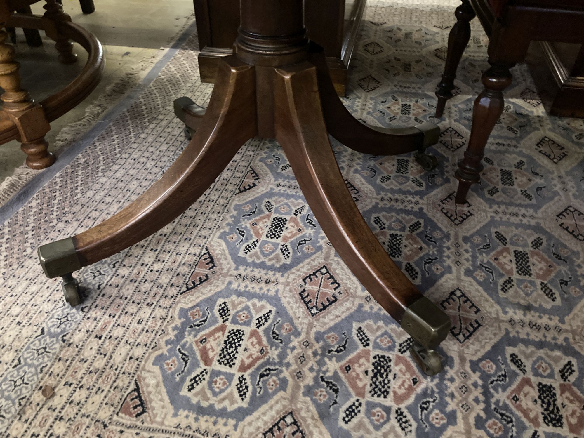 A George III oval mahogany tilt top dining table, width 158cm depth 120cm height 74cm